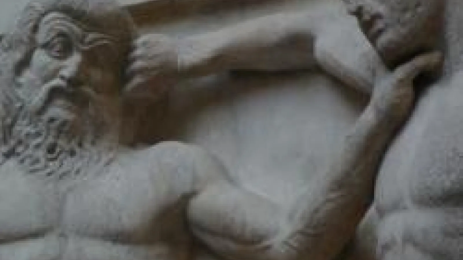 A stone carving of Zeus