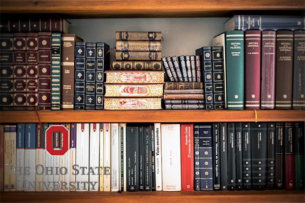 Scholarly books on a bookshelf