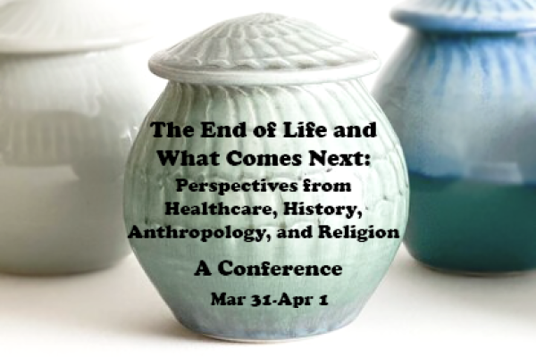 An urn with the conference title and dates